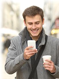 Man texting on a cell phone