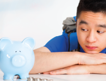 Boy with Piggy Bank